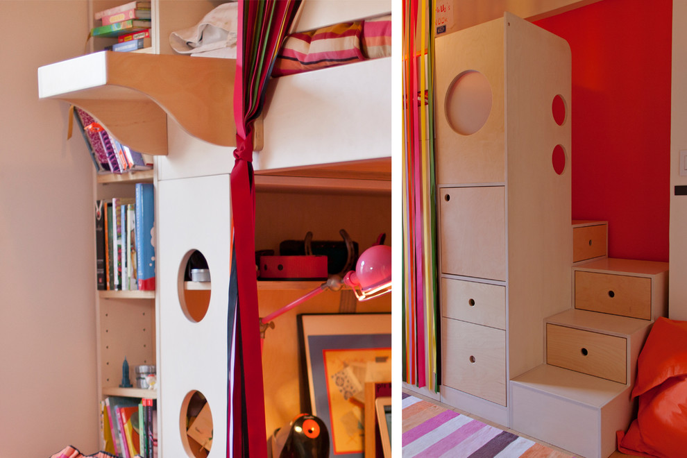 This is an example of a small contemporary kids' room for girls in New York with multi-coloured walls and light hardwood floors.