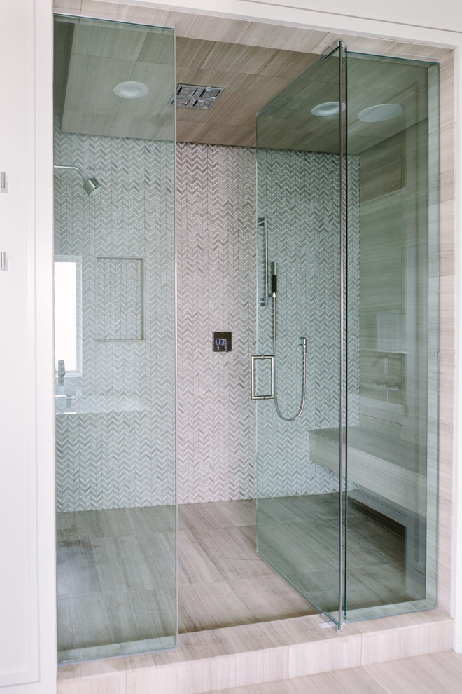 Mid-sized modern wet room bathroom in Chicago with beaded inset cabinets, white cabinets, a freestanding tub, multi-coloured tile, mosaic tile, white walls, light hardwood floors, a drop-in sink, tile benchtops, multi-coloured floor, a hinged shower door and white benchtops.