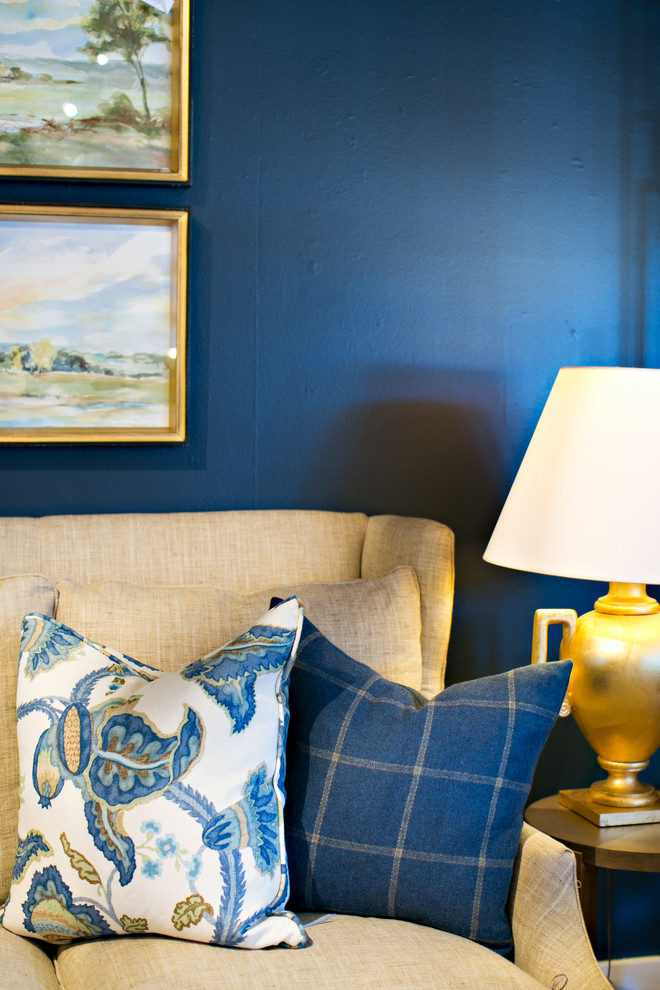 Photo of a large transitional family room in San Francisco with blue walls and medium hardwood floors.
