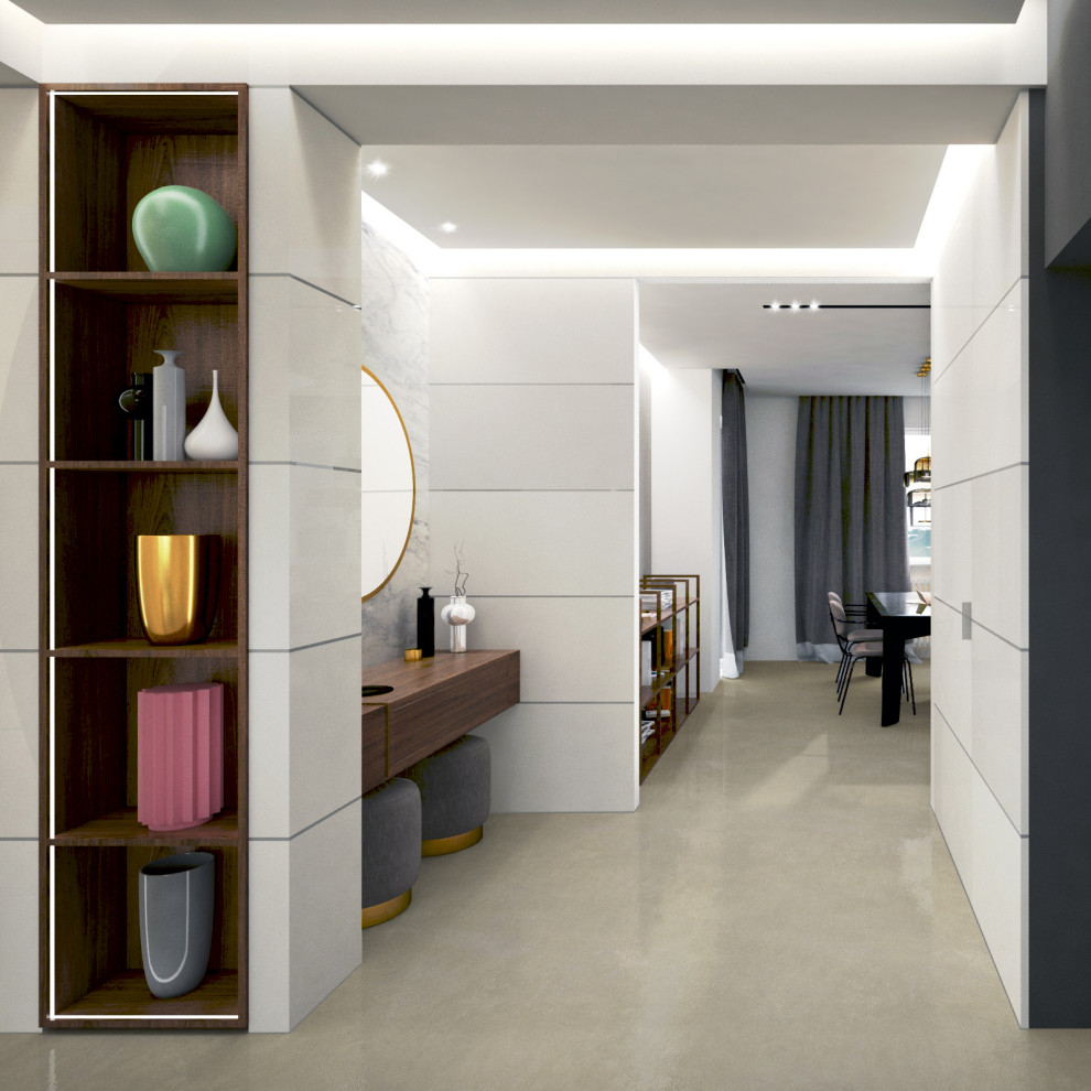 Photo of a mid-sized contemporary foyer in Rome with white walls, concrete floors, beige floor, recessed and decorative wall panelling.