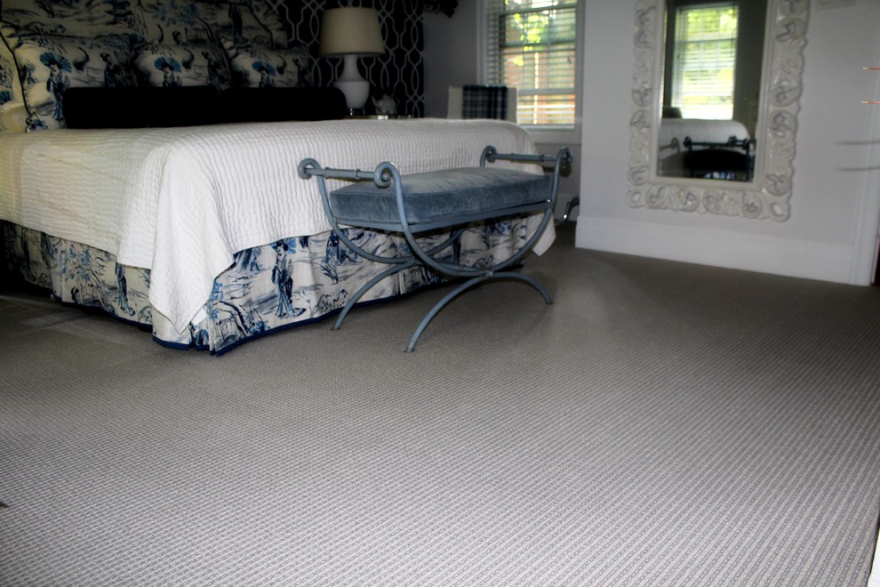 Inspiration for a mid-sized asian master bedroom in Toronto with carpet.