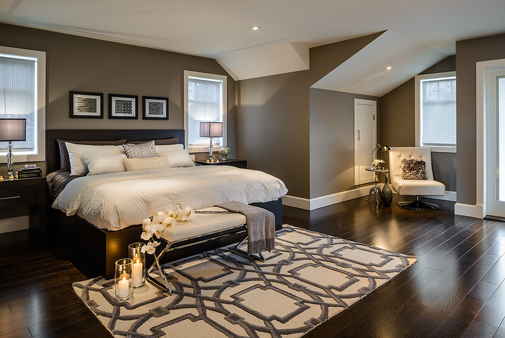 Photo of a contemporary master bedroom in Vancouver with grey walls, dark hardwood floors and no fireplace.