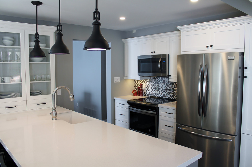 Example of a transitional kitchen design in Toronto