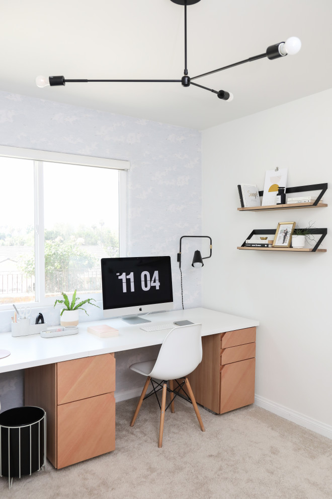 This is an example of a small contemporary study room in San Diego with white walls, carpet, no fireplace, a built-in desk, beige floor and wallpaper.