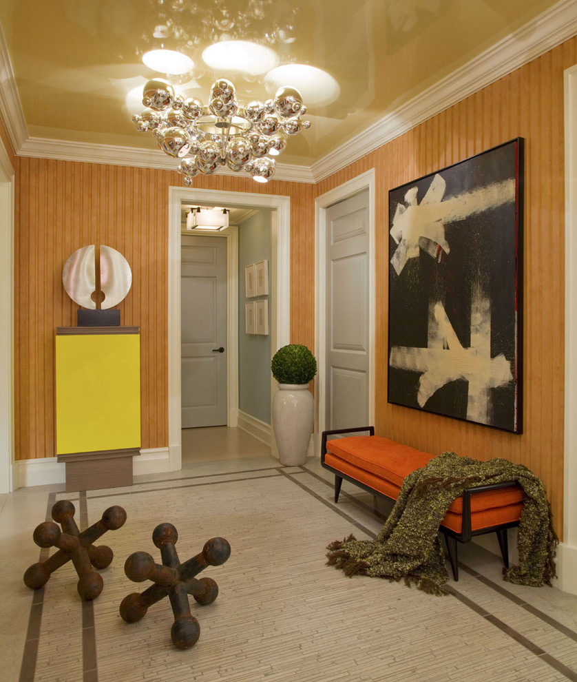 Contemporary vestibule in New York with orange walls.