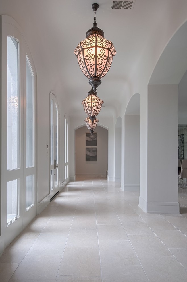 Design ideas for a large contemporary hallway in Other with white walls and porcelain floors.