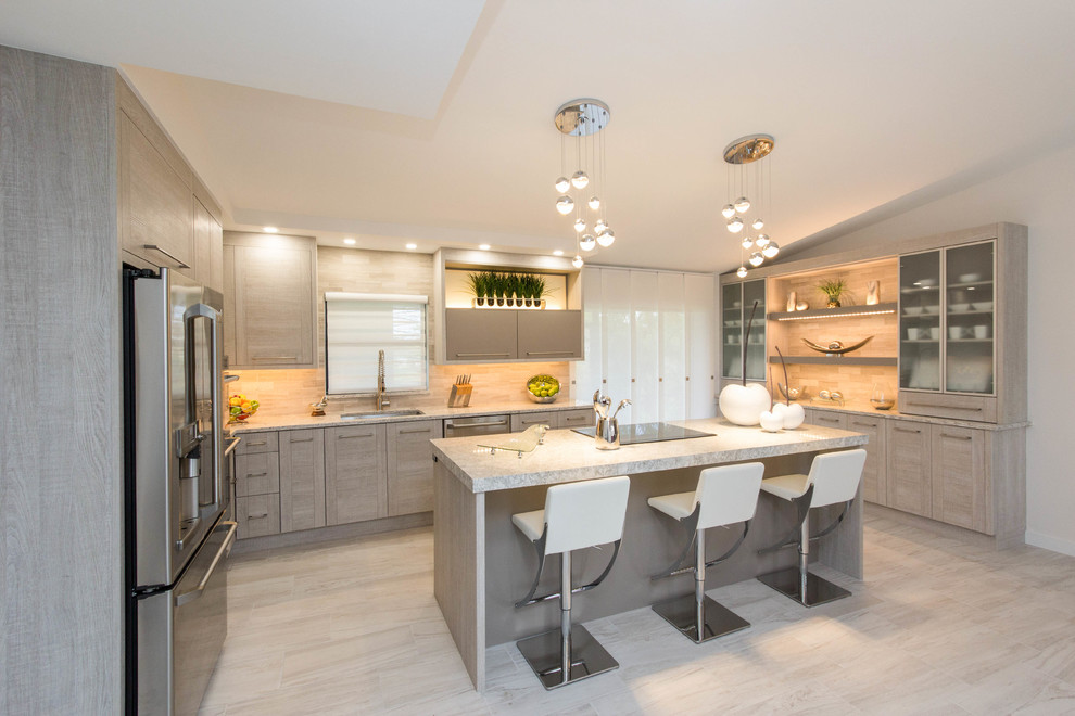 Design ideas for a mid-sized contemporary u-shaped open plan kitchen in Miami with an undermount sink, flat-panel cabinets, distressed cabinets, quartz benchtops, brown splashback, stone tile splashback, stainless steel appliances, porcelain floors and with island.