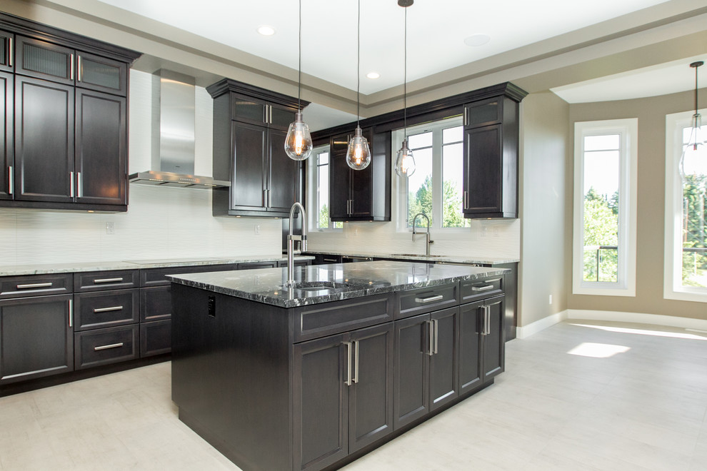 Transitional home design photo in Edmonton