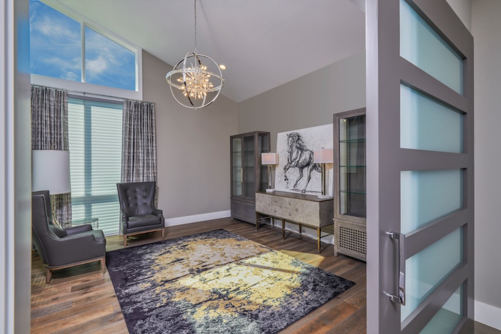 Example of a transitional home office design in Austin