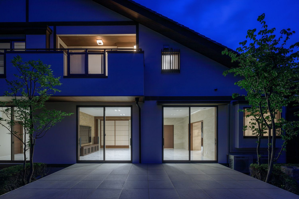 Diseño de terraza planta baja de estilo zen grande sin cubierta en patio