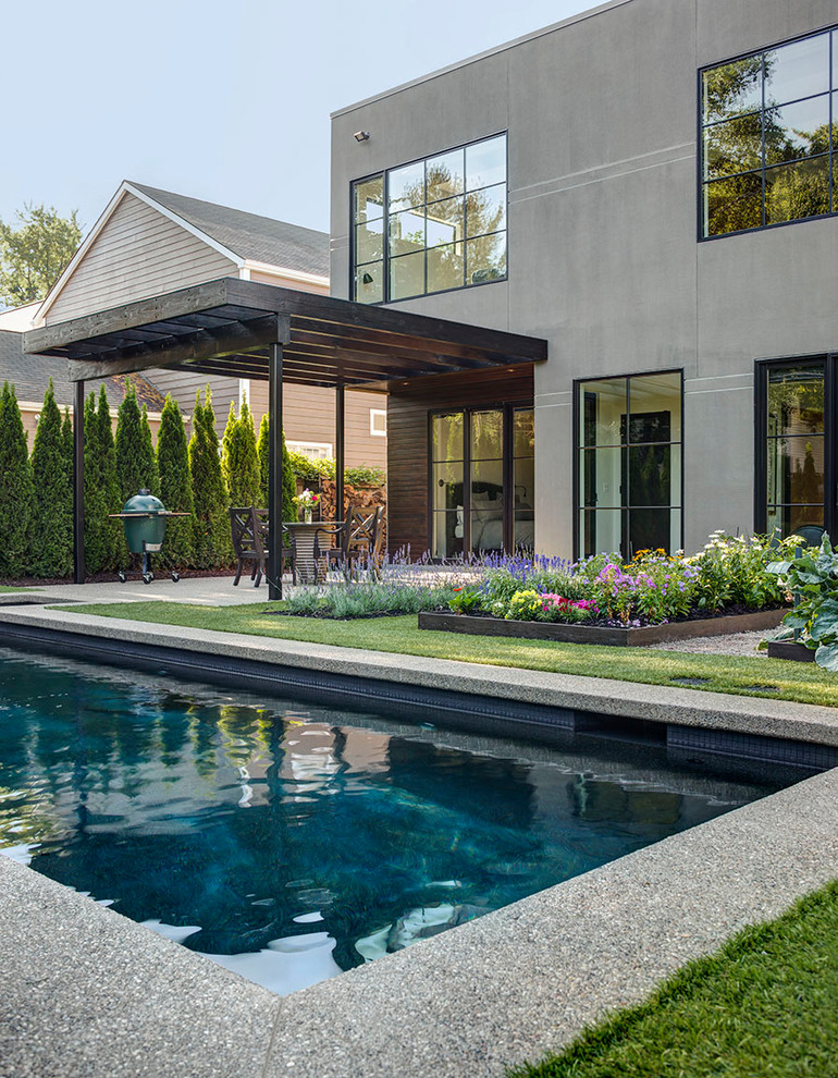 Design ideas for a contemporary pool in Detroit.