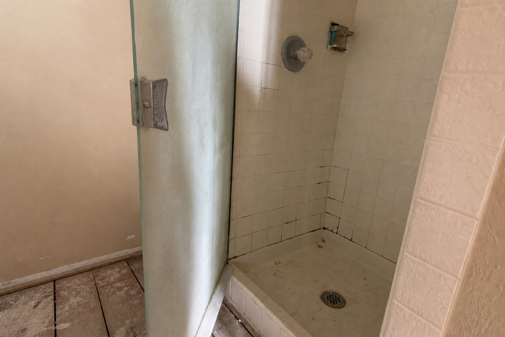 BEFORE: ORIGINAL ENCLOSED SHOWER