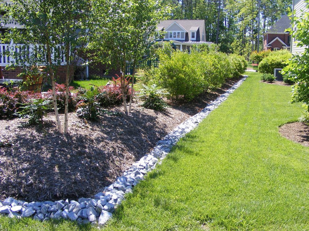 Design ideas for a large transitional partial sun backyard gravel garden path for summer.