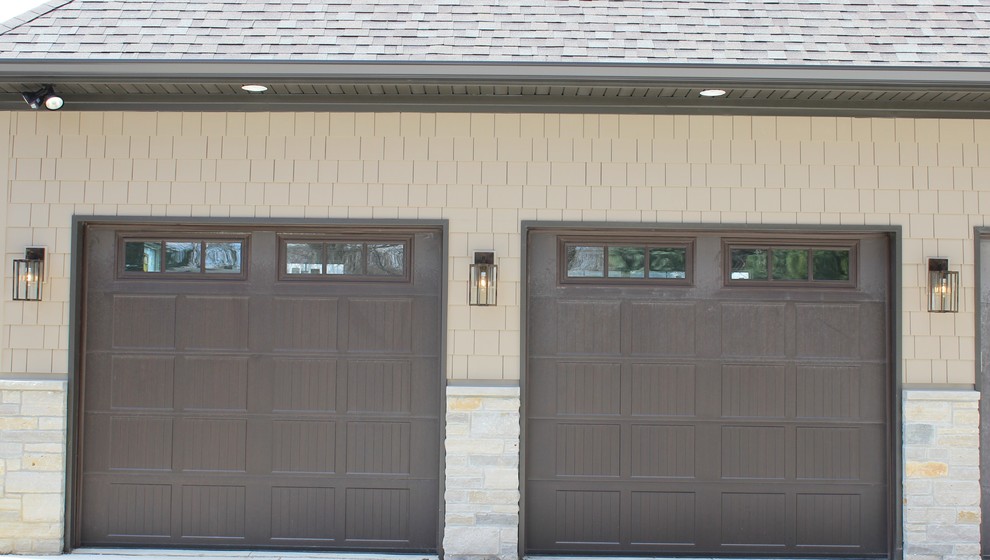 Example of a transitional garage design in Chicago