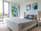 Beach Style Bedroom by Studio M Interior Design, Inc