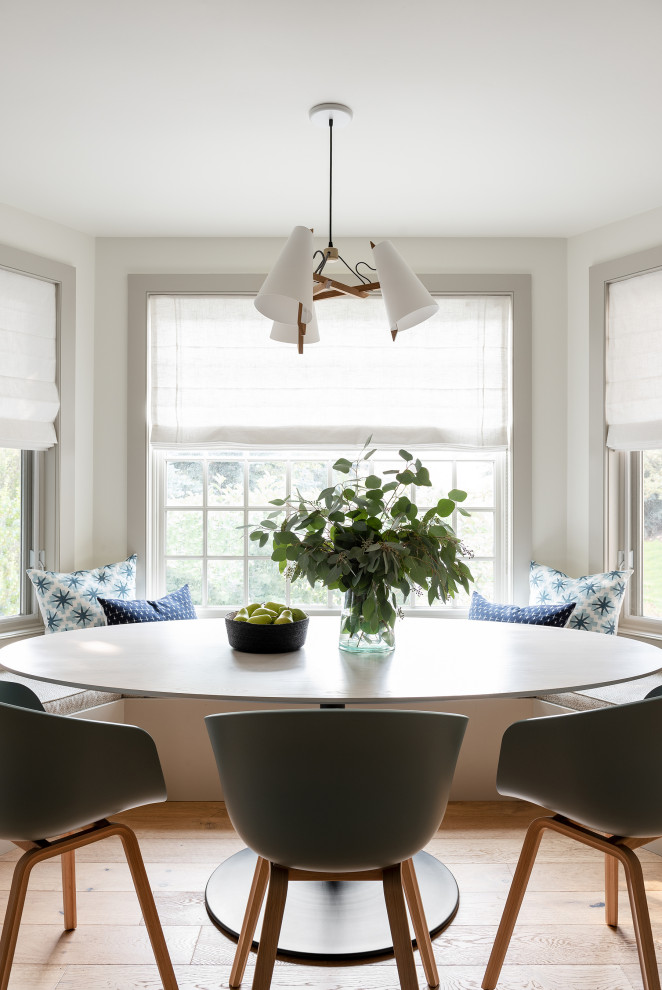 Transitional dining room in Other.