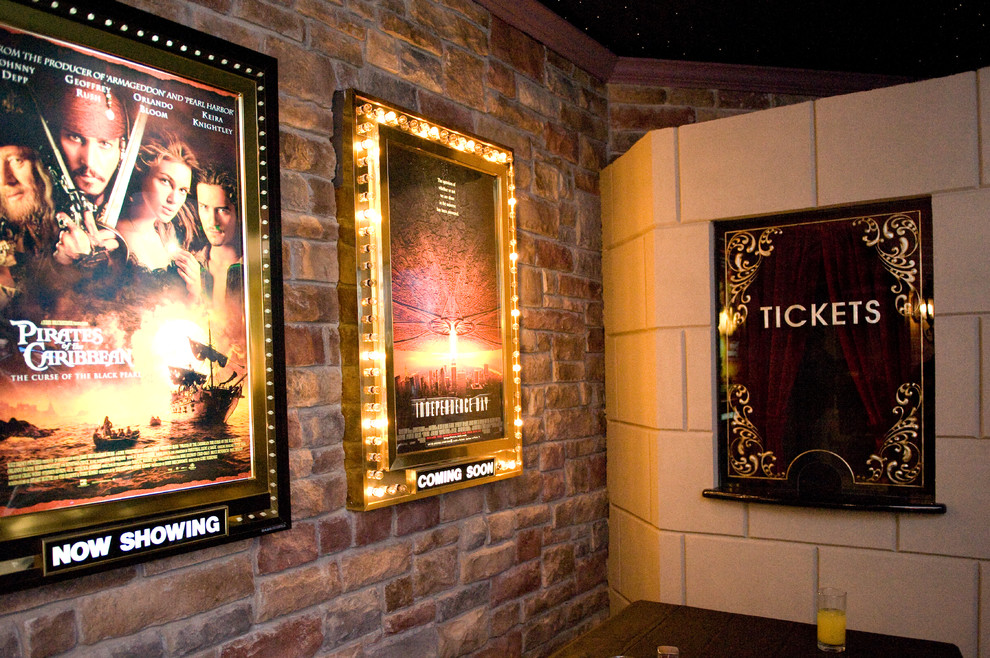 Theater Room Entry With Light Up Movie Poster Cases and Ticket Booth