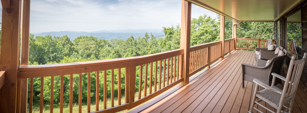 Inspiration for a huge rustic rooftop deck remodel in Charlotte