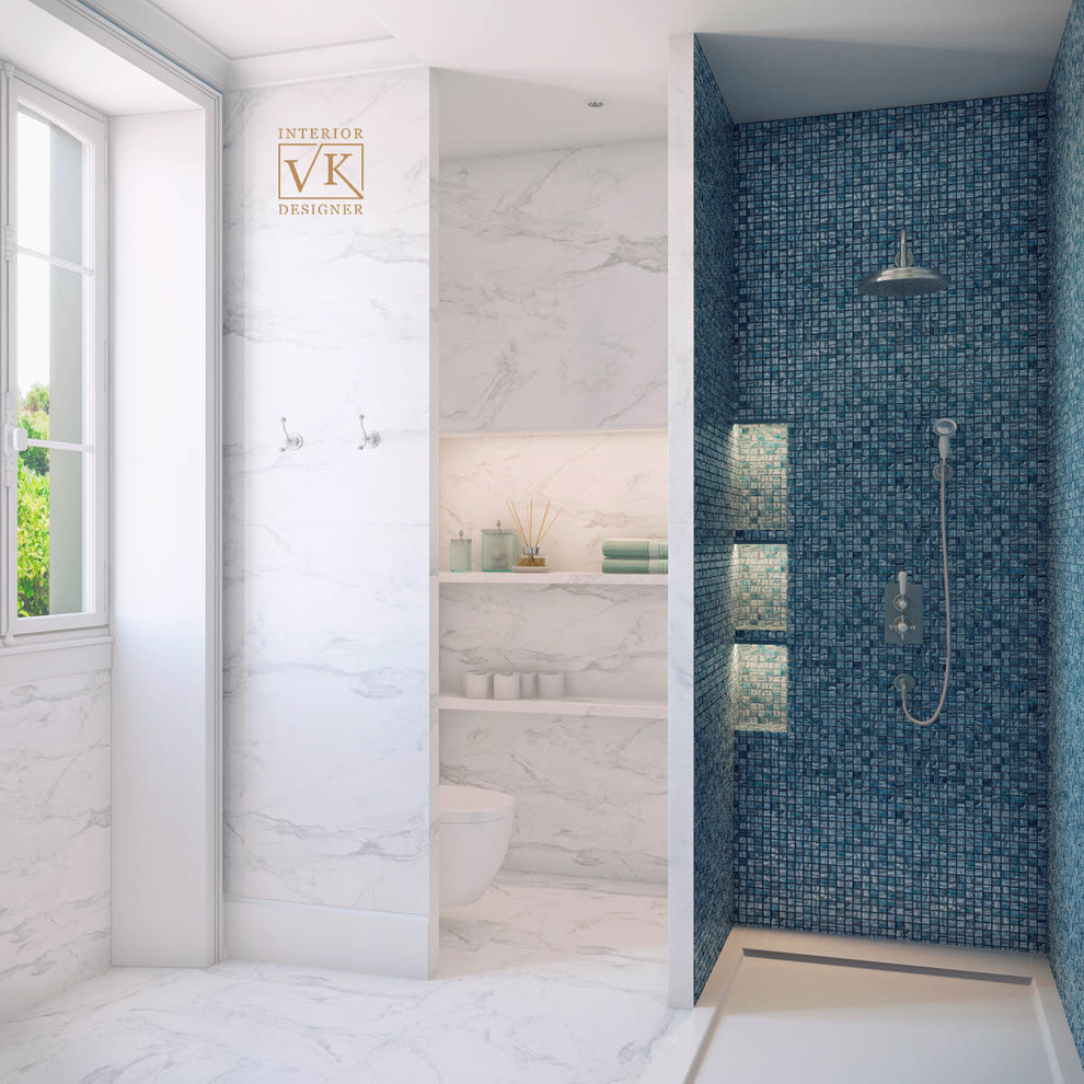 This is an example of a mid-sized contemporary master bathroom in Other with a curbless shower, a wall-mount toilet, blue tile, white walls, marble floors and white floor.