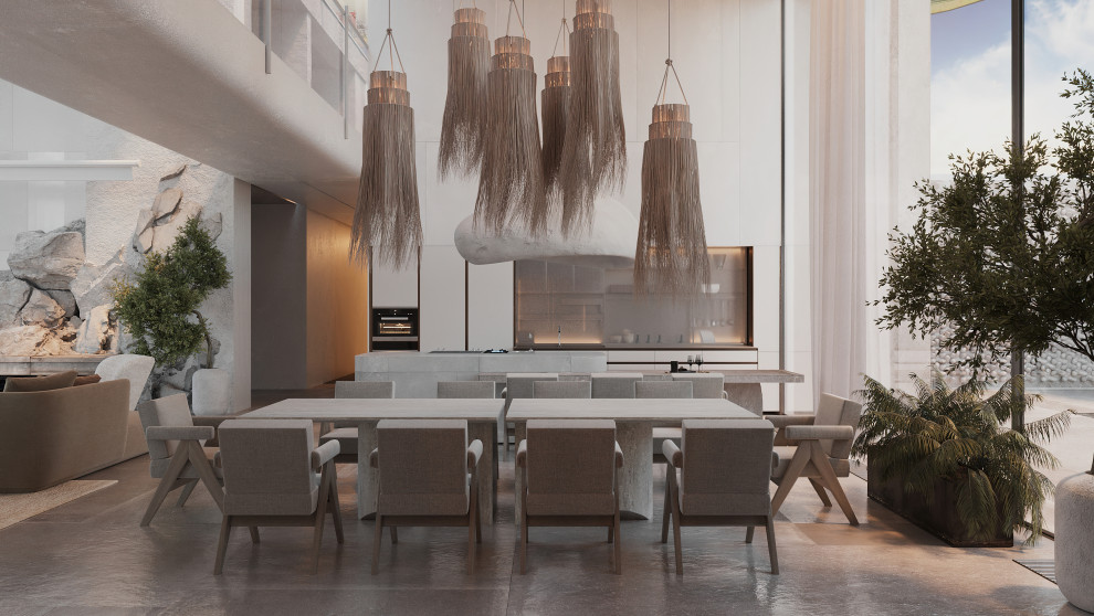 Idee per una sala da pranzo aperta verso la cucina moderna di medie dimensioni con pareti bianche, pavimento in marmo, camino classico e cornice del camino in pietra