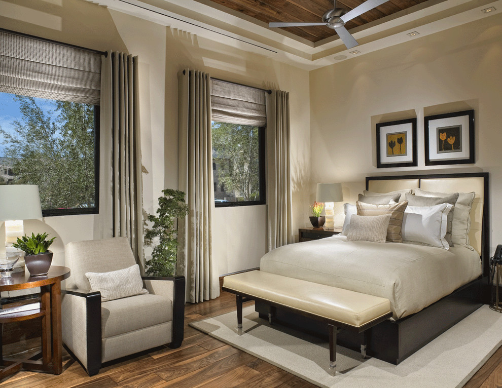 Inspiration for a contemporary bedroom in Salt Lake City with beige walls and dark hardwood floors.