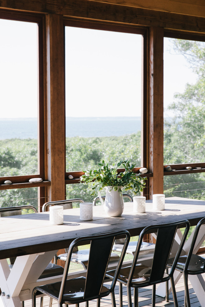 Example of a transitional sunroom design in Boston