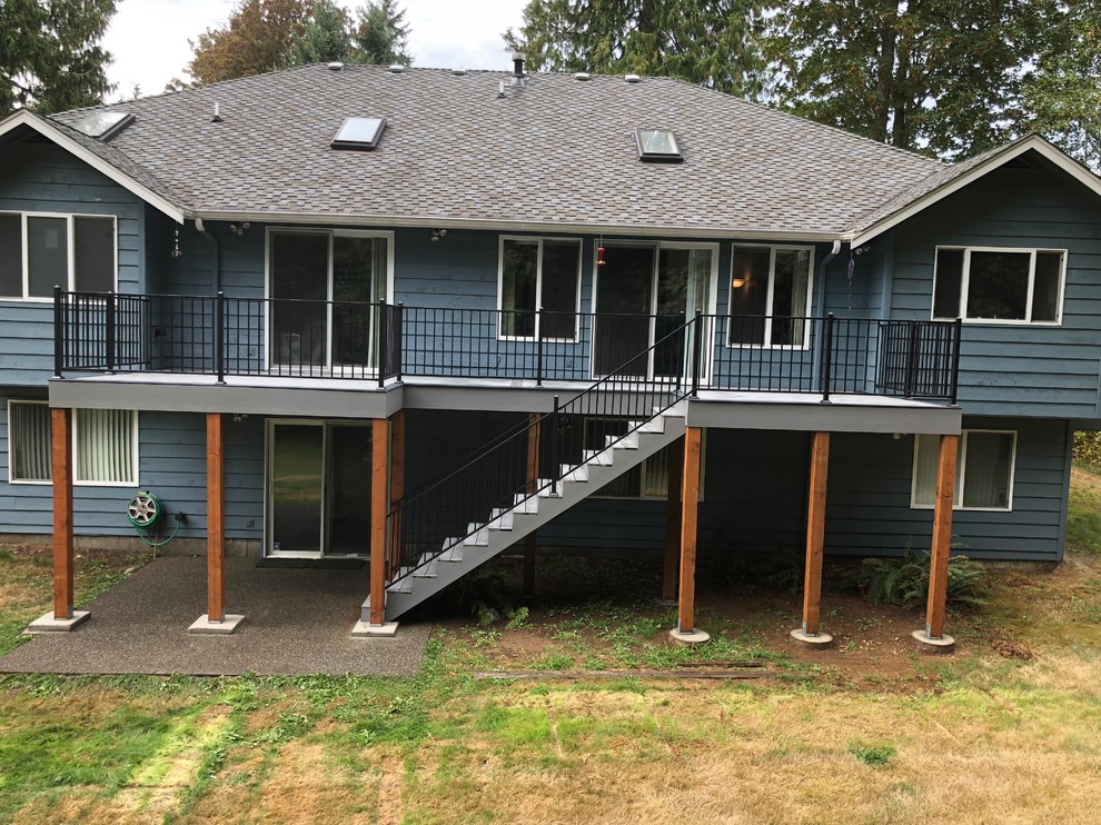 Deck - mid-sized transitional backyard deck idea in Seattle with no cover