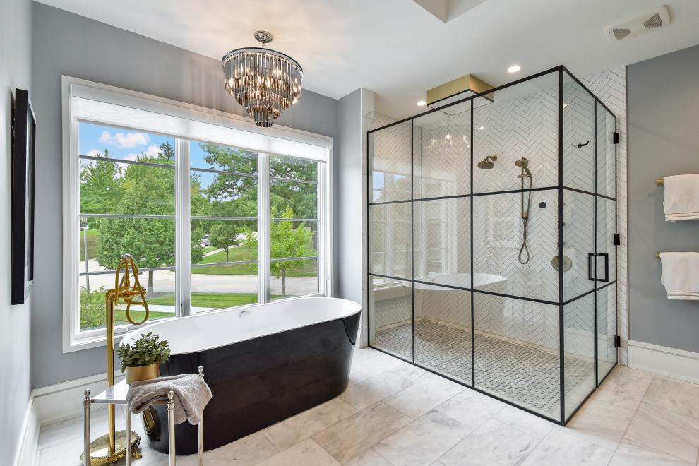 Inspiration for a large contemporary master bathroom in Chicago with a freestanding tub, a corner shower, porcelain tile, travertine floors, grey floor, a hinged shower door, white tile and grey walls.