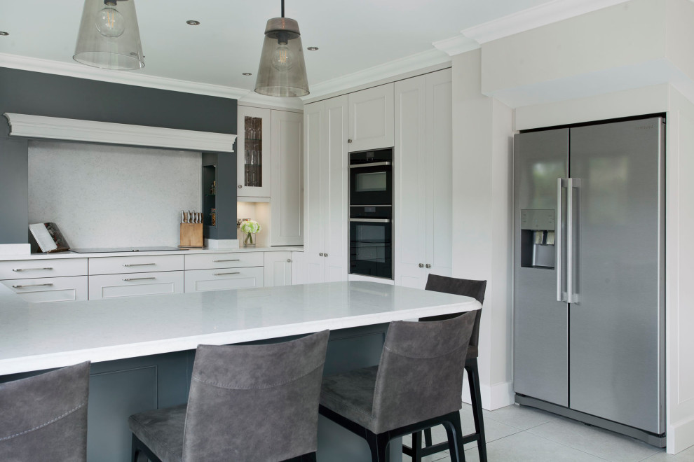 Photo of a medium sized contemporary u-shaped kitchen/diner in Other with shaker cabinets.