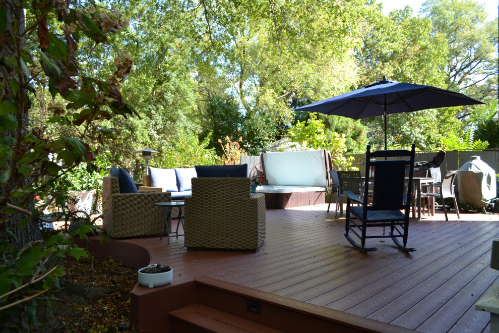 Deck - mid-sized transitional backyard stone deck idea in Baltimore with a fire pit and no cover
