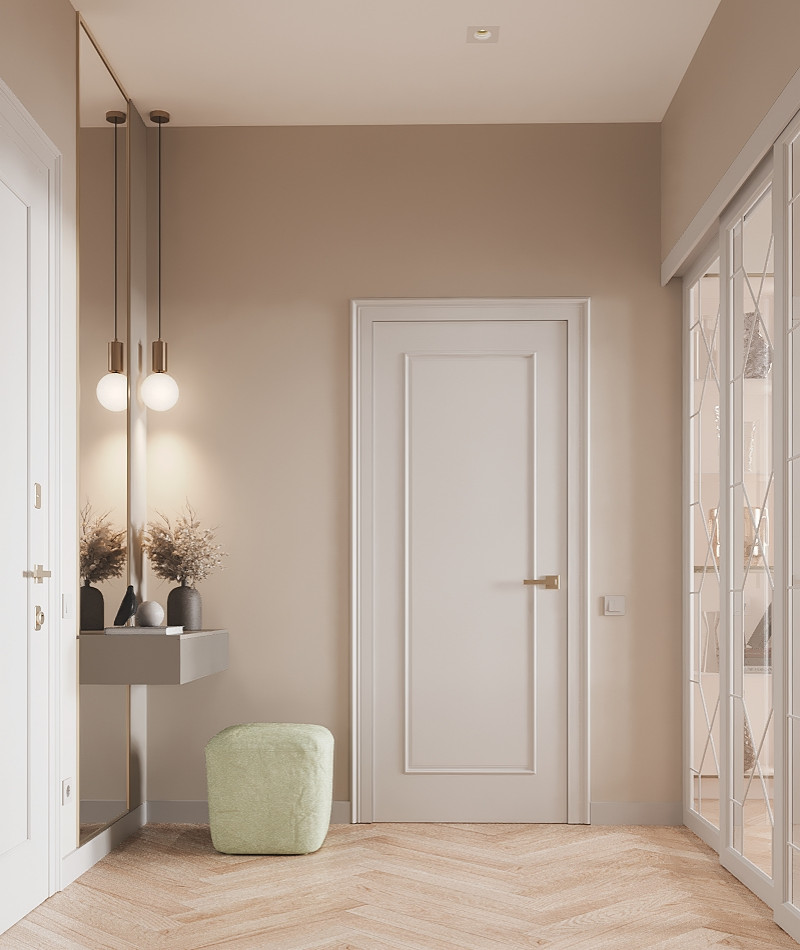Cette image montre une entrée design avec un mur beige, un sol en vinyl et une porte blanche.