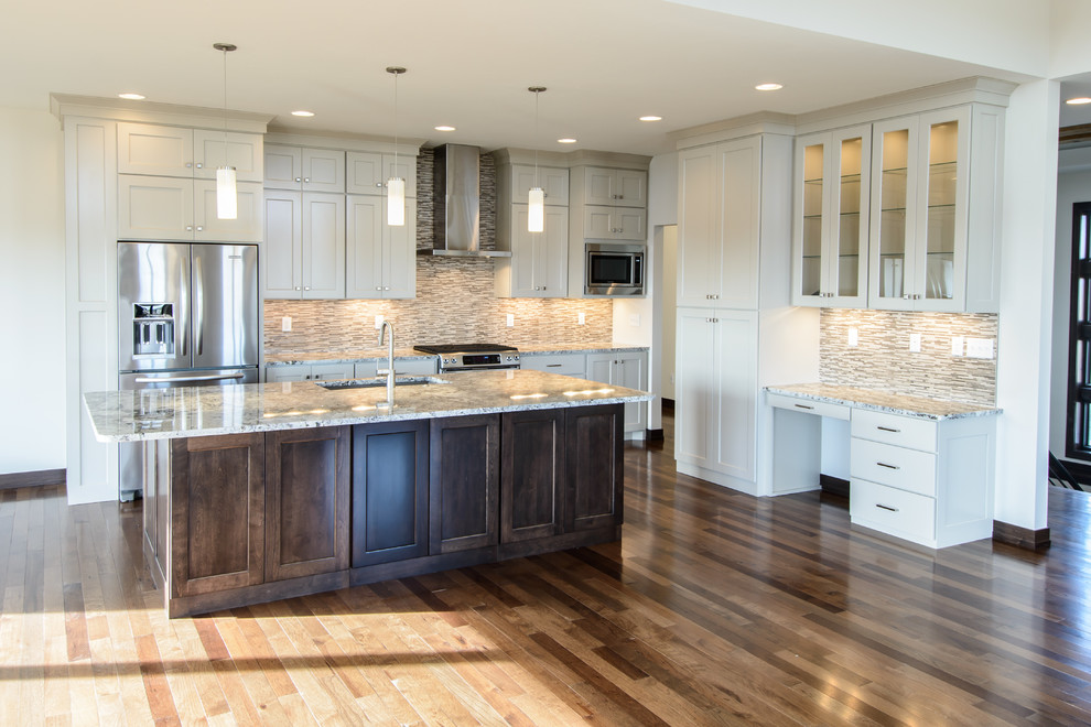 Inspiration for a transitional l-shaped medium tone wood floor open concept kitchen remodel with a farmhouse sink, shaker cabinets, white cabinets, stainless steel appliances and an island