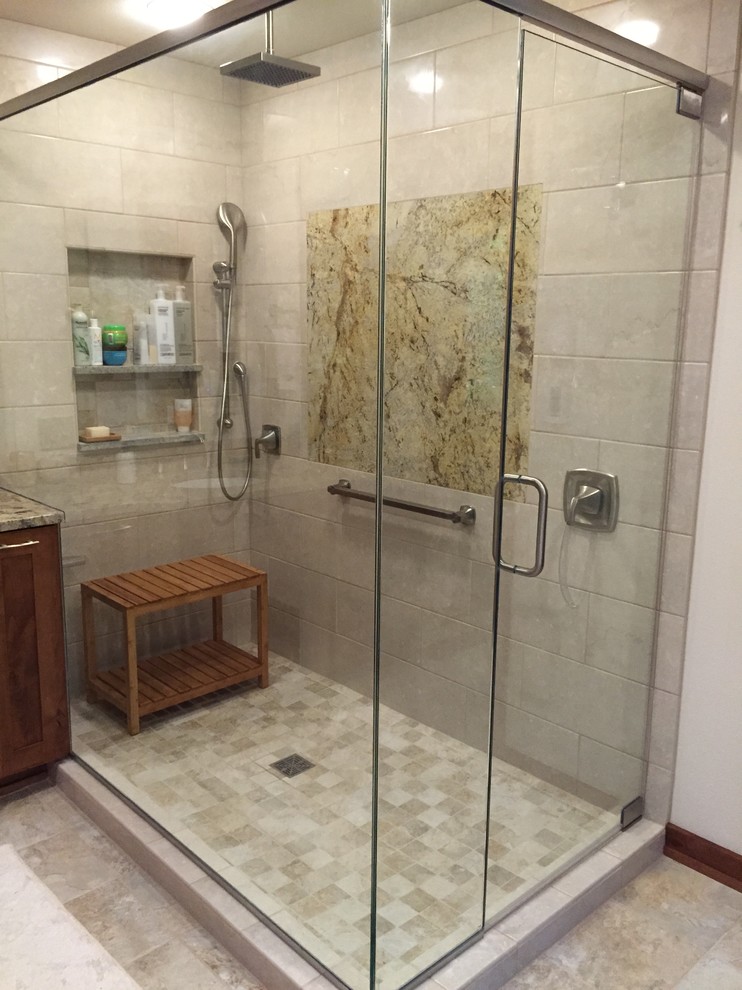 Corner shower - transitional corner shower idea with recessed-panel cabinets, medium tone wood cabinets and granite countertops