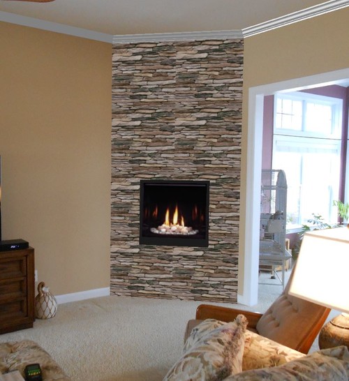 Before & After: Modern direct vent fireplace with stone veneer This client
