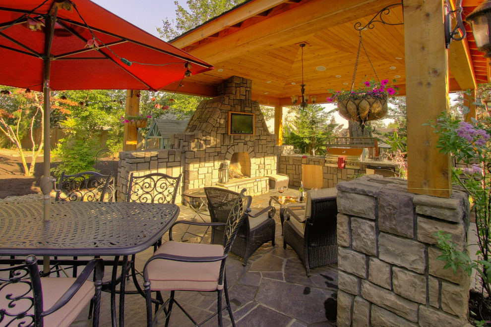 Inspiration for a mediterranean patio in Portland with a gazebo/cabana and a fire feature.