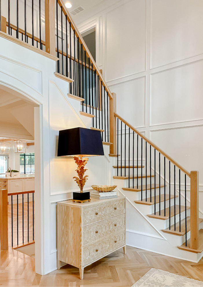 Traditional l-shaped wood railing staircase in Atlanta with panelled walls.