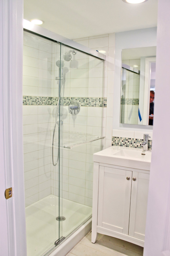 This is an example of a large traditional bathroom in Chicago with white walls and concrete floors.