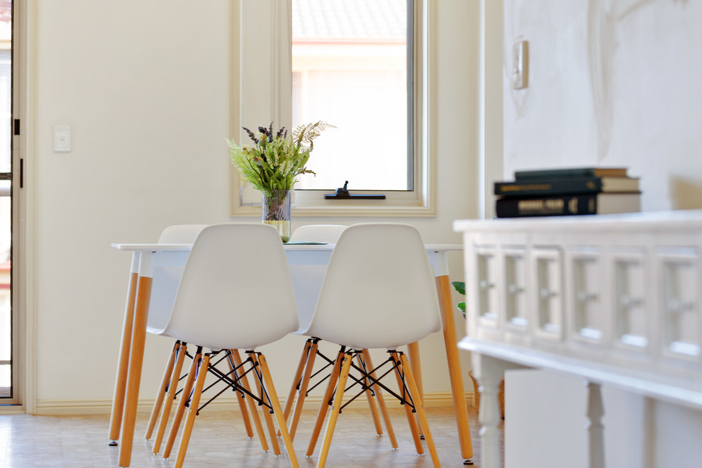 This is an example of a contemporary dining room in Central Coast.