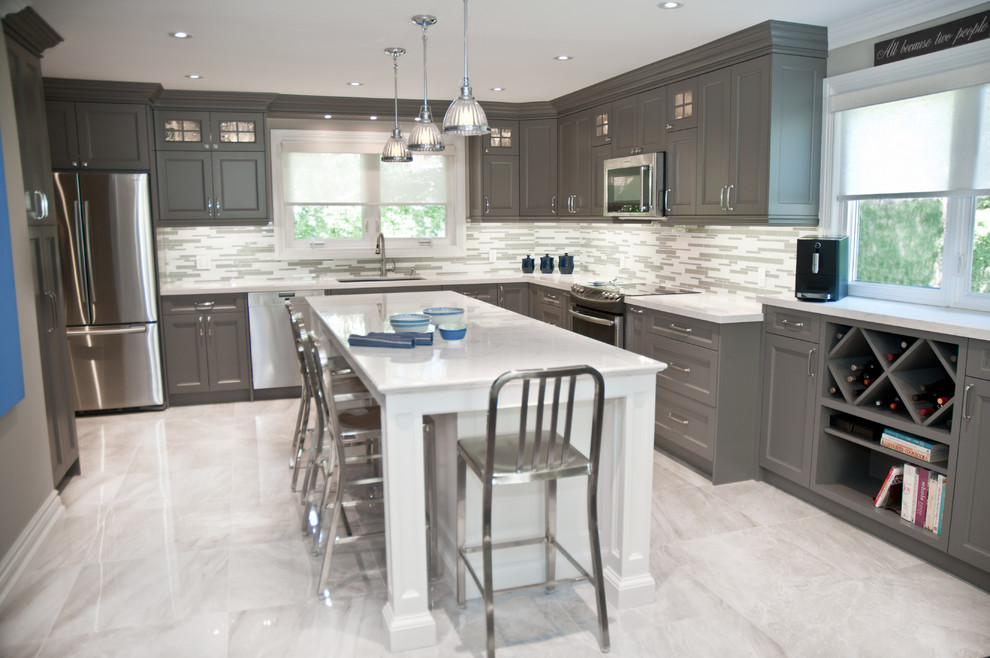 Mid-sized transitional u-shaped kitchen in Toronto with an undermount sink, shaker cabinets, grey cabinets, quartz benchtops, yellow splashback, mosaic tile splashback, stainless steel appliances, marble floors and with island.