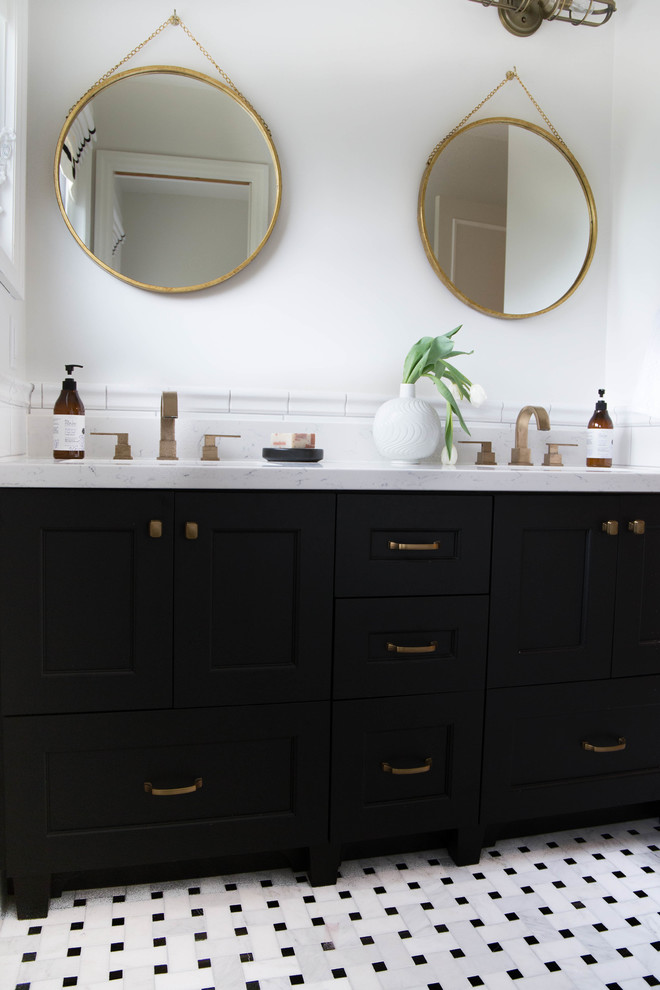 This is an example of a small transitional kids bathroom in Toronto with shaker cabinets, black cabinets, a shower/bathtub combo, a one-piece toilet, white tile, subway tile, white walls, mosaic tile floors, engineered quartz benchtops, white floor and a shower curtain.