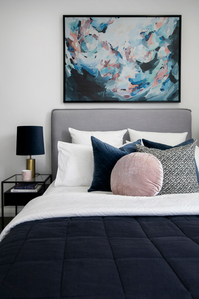 This is an example of a mid-sized contemporary bedroom in Sydney with grey walls.
