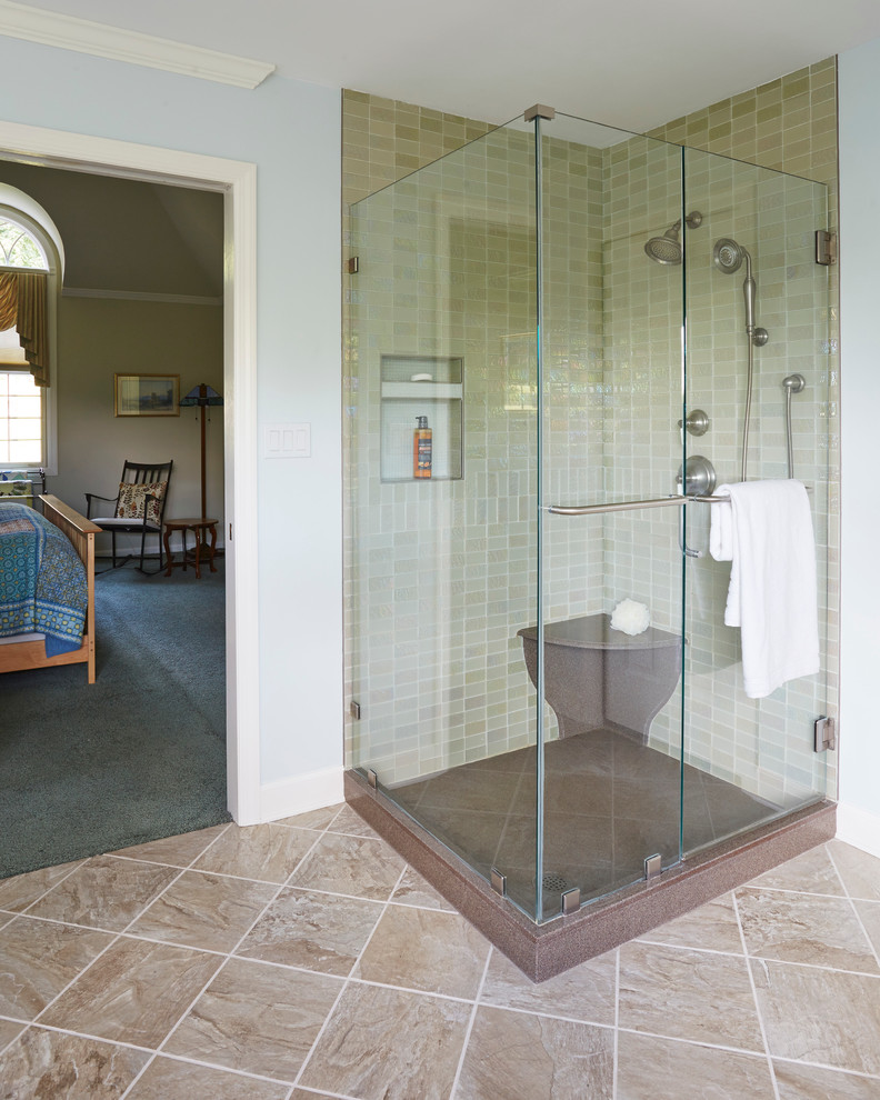 This is an example of a large scandinavian master bathroom in Other with a corner shower, green tile, glass tile, blue walls, porcelain floors, beige floor and a hinged shower door.