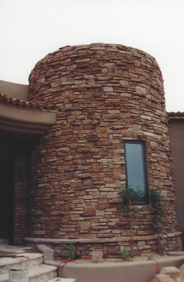 Rustic exterior home idea in Phoenix