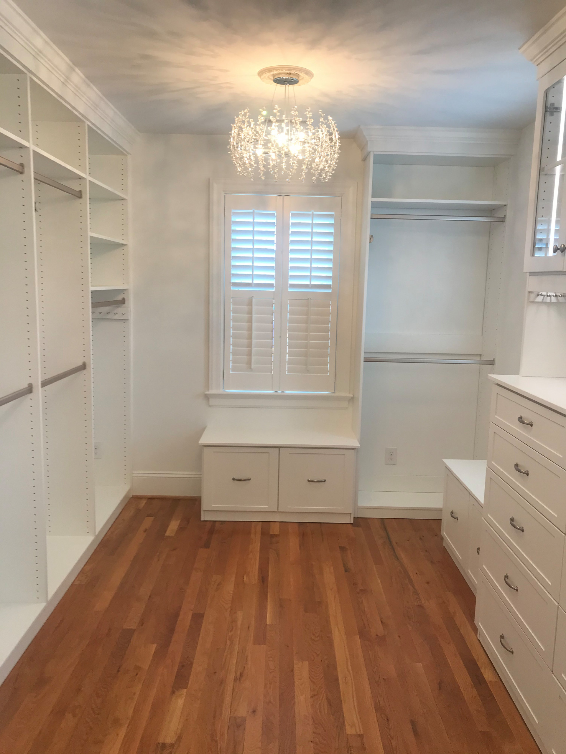 Lighted White Dressing Room with Chandeliers