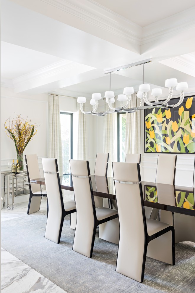 This is an example of a contemporary dining room in Miami.