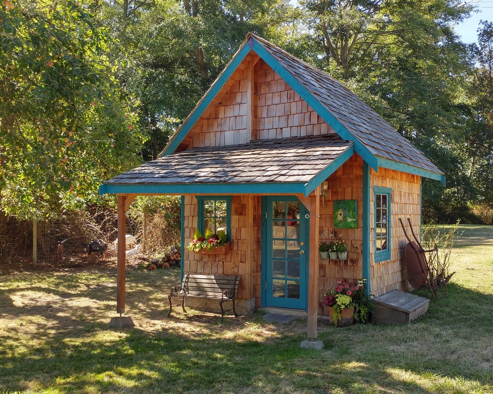 Mid-sized country detached garden shed in Seattle.