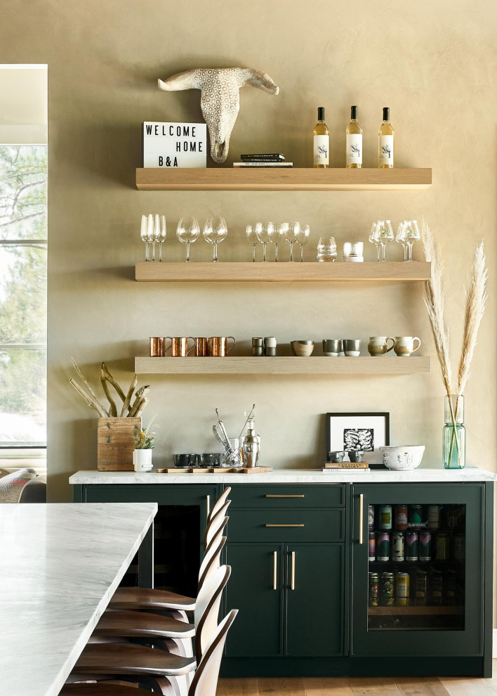 Country home bar in Denver with green cabinets and white benchtop.