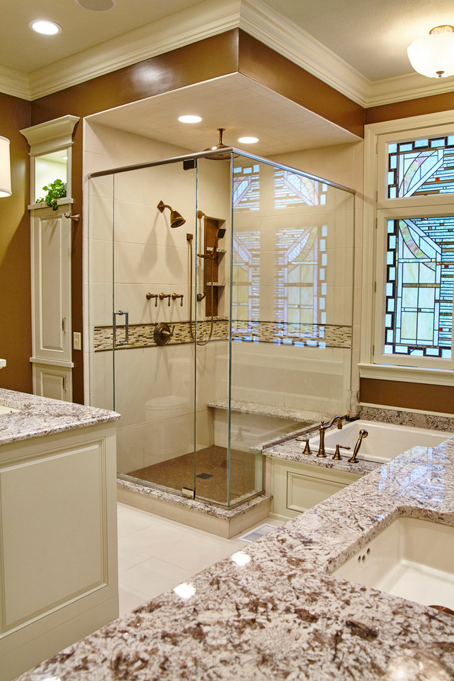 Corner bathtub - mid-sized transitional master beige tile, black tile, white tile and stone slab ceramic tile corner bathtub idea with raised-panel cabinets, white cabinets, a one-piece toilet, red walls, a drop-in sink and solid surface countertops
