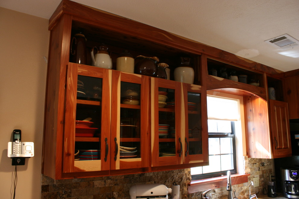 Example of a mountain style kitchen design in Austin