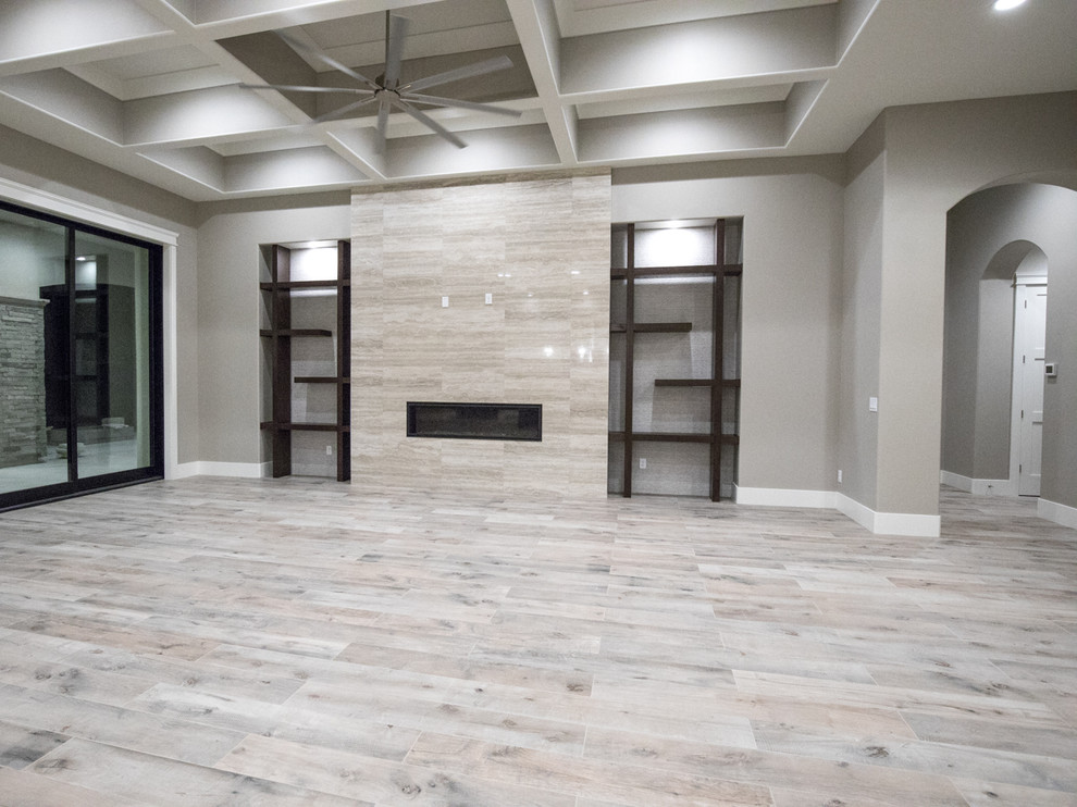 Example of a transitional home design design in Phoenix